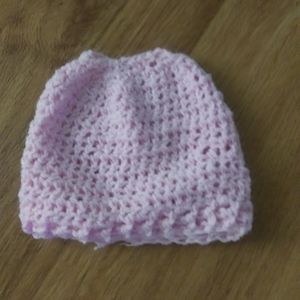 Crocheted messy bun hat